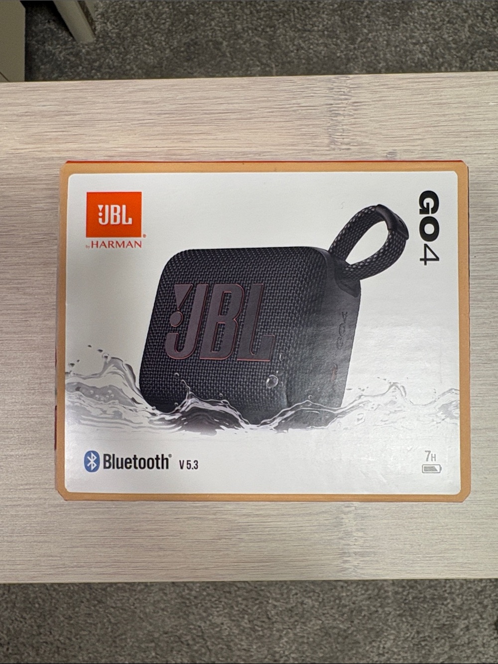 JBL GO 4 Portable Bluetooth Speaker - Black with Orange Accent